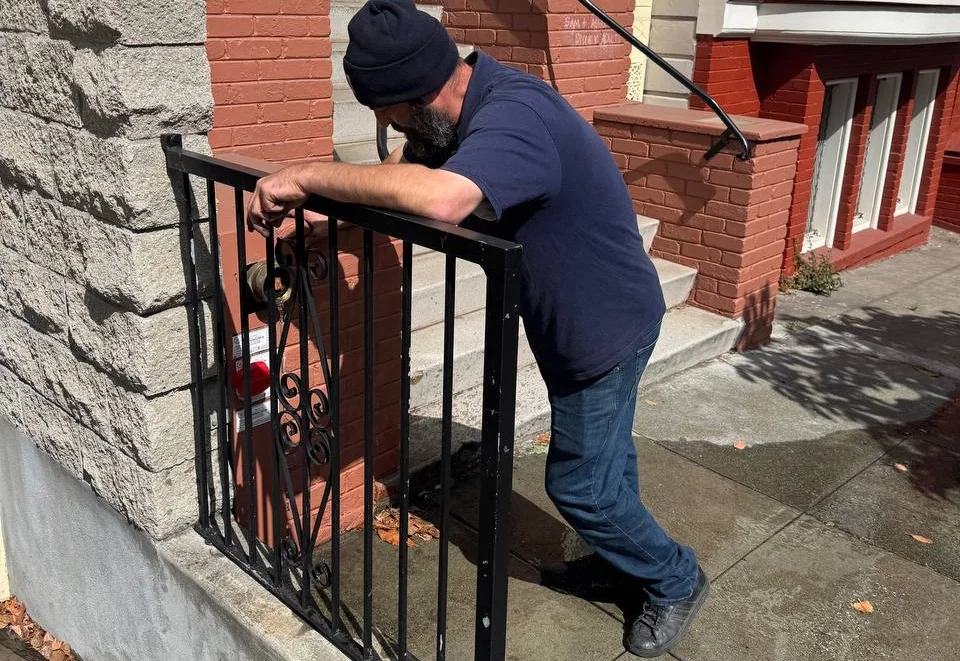 Testing and inspection of the fire sprinkler system water connections on Henry St.